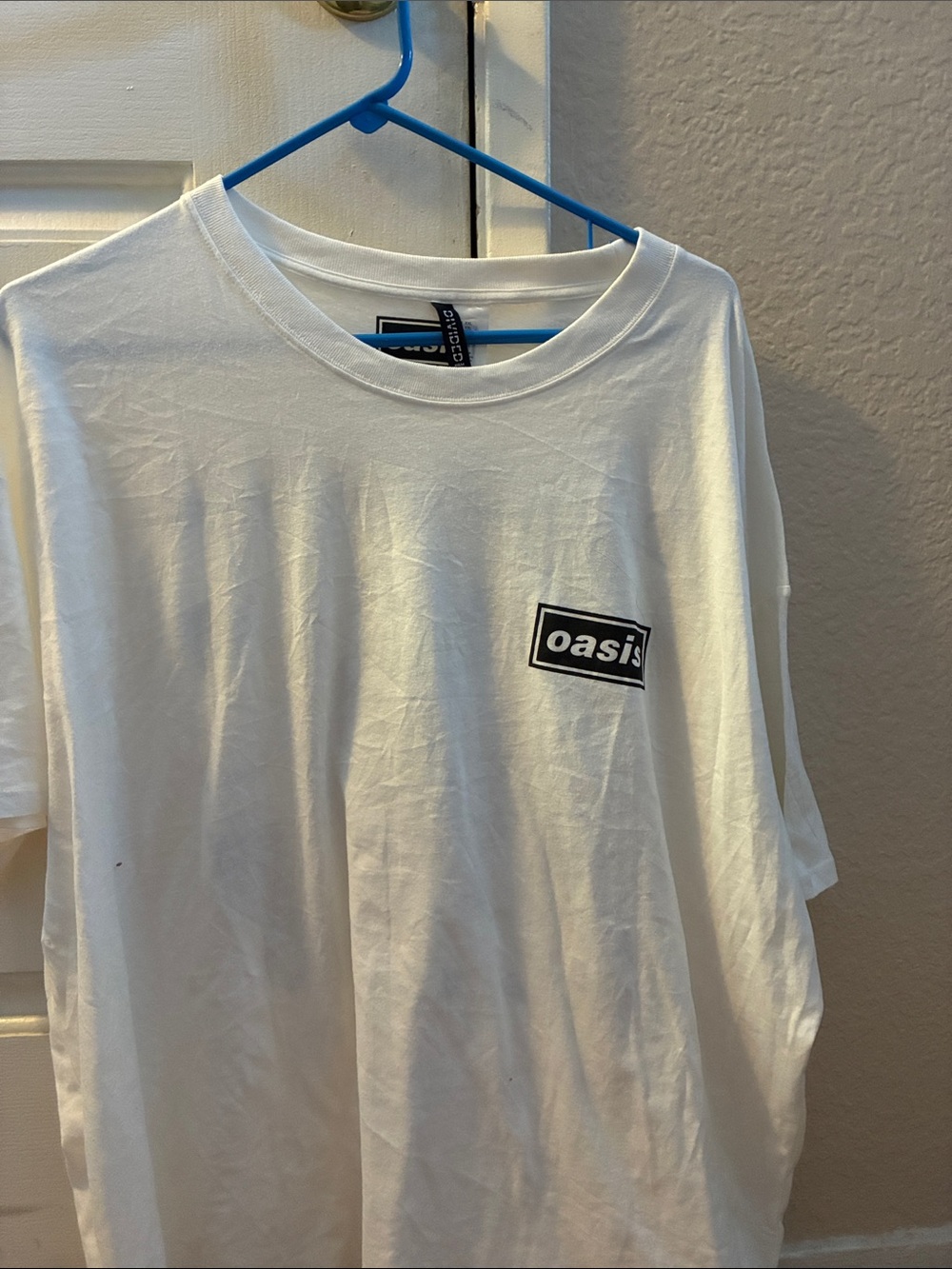 Oasis White Short-Sleeve Tee with Black Chest Logo